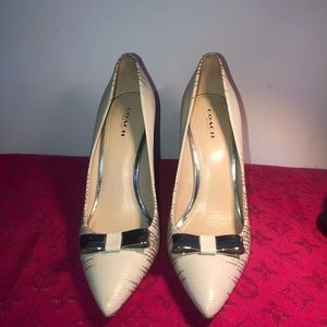 Beautiful stilettos by COACH. Size 9. Very comfortable and great condition.